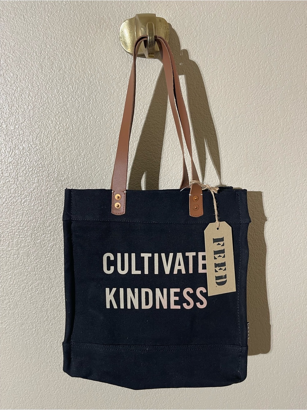 Feed Black Canvas Tote with Brown Straps - "Cultivate Kindness"